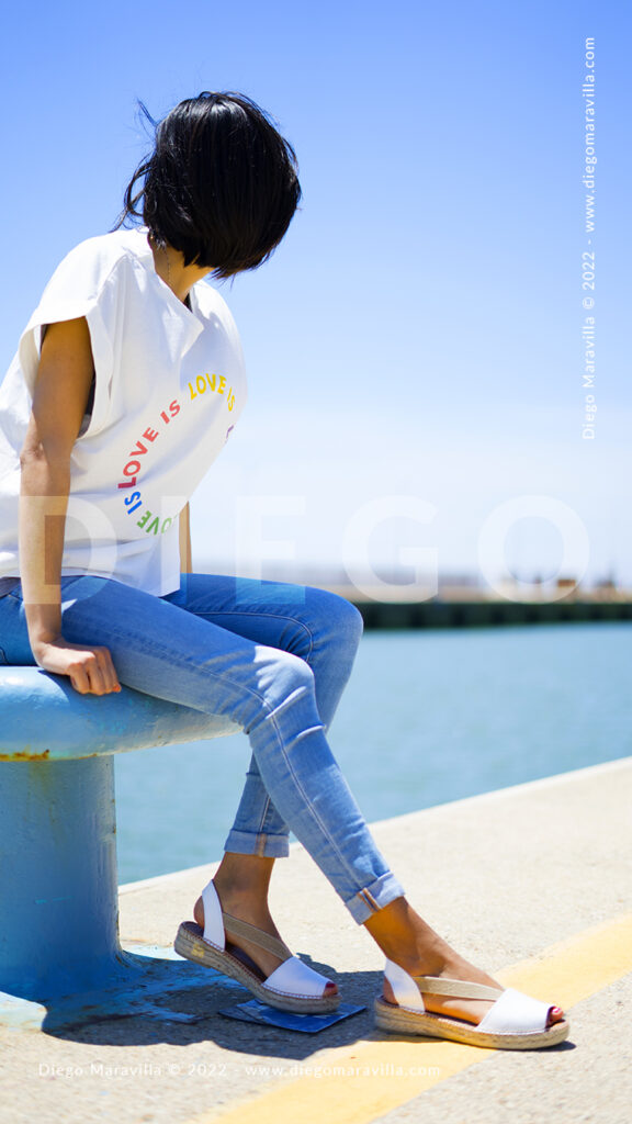 Girl modeling on the beach in summer time