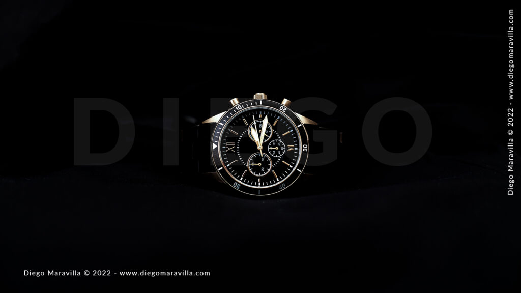 Wrist mechanical watch for man on a black background
