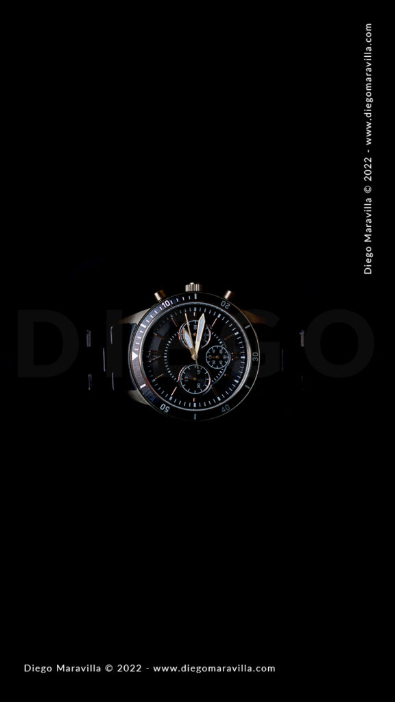 Wrist mechanical watch on a black background