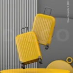 Two yellow suitcases floating on modern yellow podium